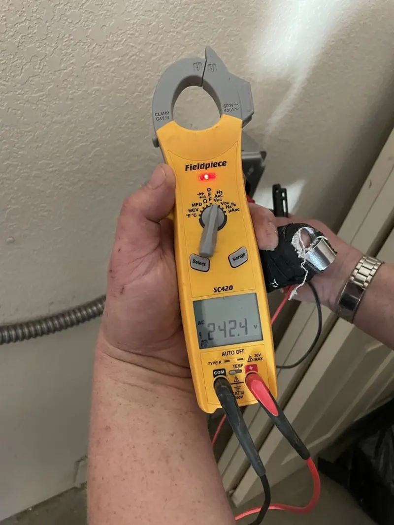 Voltage testing with clamp meter during Aluminum Wiring Replacement in Montague